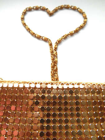 Golden texture heart on a white の写真素材