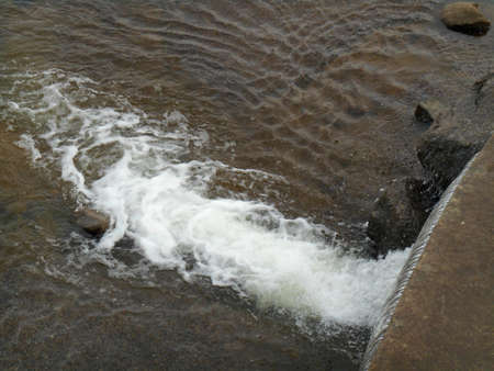 The water and stones on the waterfallの写真素材