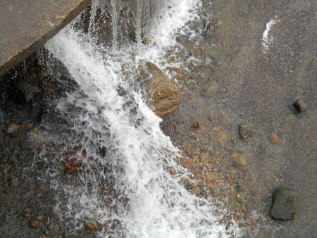 The water and stones on the waterfallの写真素材