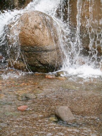 The water and stones on the waterfallの写真素材