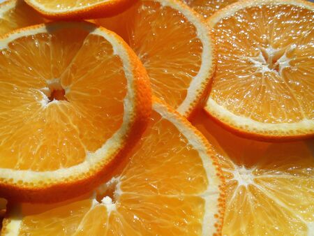 Juicy orange sliced backgroundの写真素材