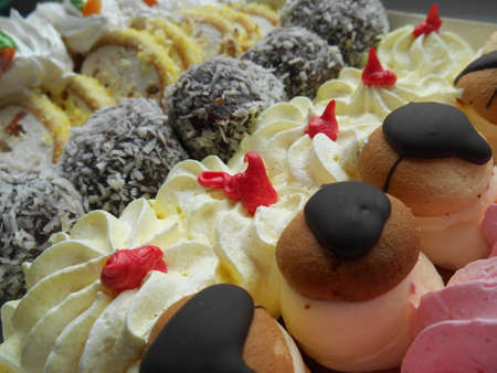 Set of cream cakes backgroundの写真素材