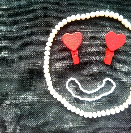 Love smail pearls, black backgroundの素材