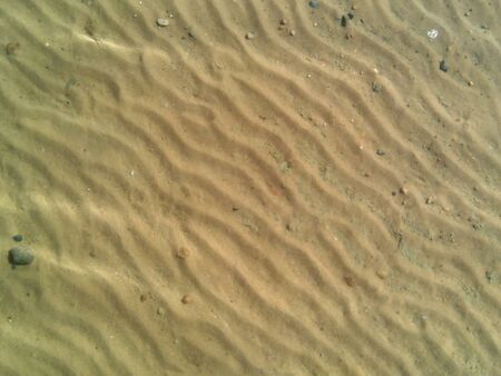 Sand and clear water texture background