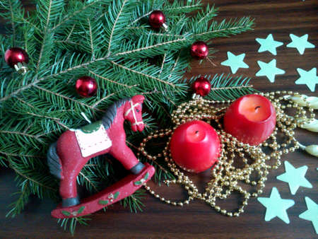 Christmas decorations on a brown wood backgroundの素材