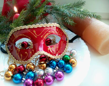 New years and christmas decorations balls and maskの素材