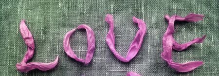 Pink love text on a natural backgroundの素材