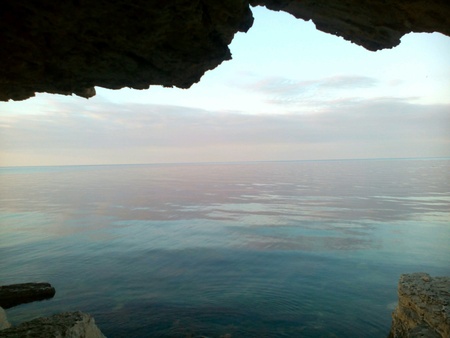 Dawn on the sea shore Crimea landscape on a cave backgroundの素材