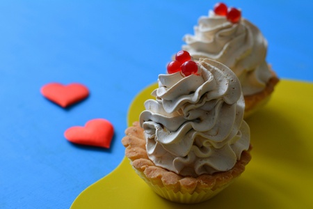 Two cakes and red hearts blue backgroundの素材