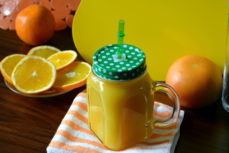 Orange juice and fruits towel backgroundの素材