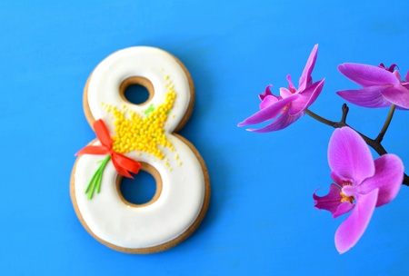 8 March gingerbread and orchid blue background