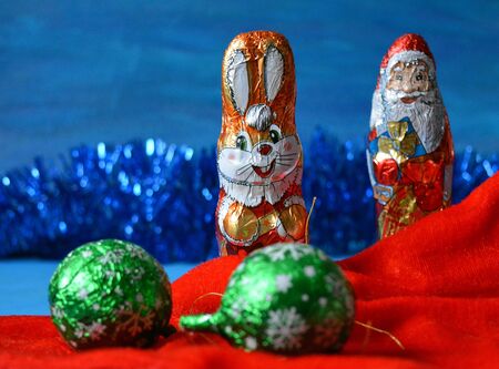 Christmas and  New Year rabbit and Santa Claus sweets blue backgroundの素材