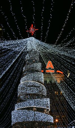 Christmas and New year tree night city backgroundの素材