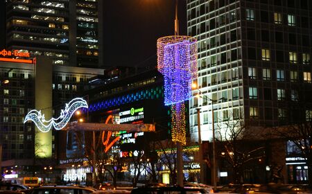 Christmas and New year lights night city view dark backgroundの素材