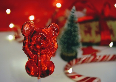 New year candy lollipop the mouse and christmas decorations holiday background