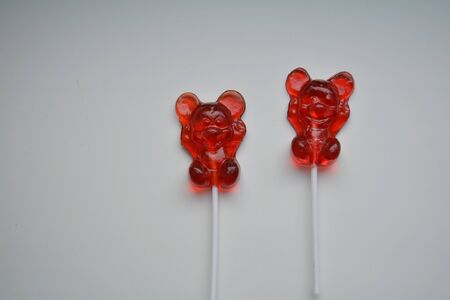 Christmas and New year candy lollipops the mouse on a white backgroundの素材