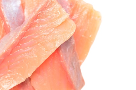 piece of red fish fillet isolated on white の写真素材