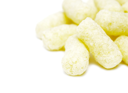 sweet corn flakes isolated on white backgroundの写真素材