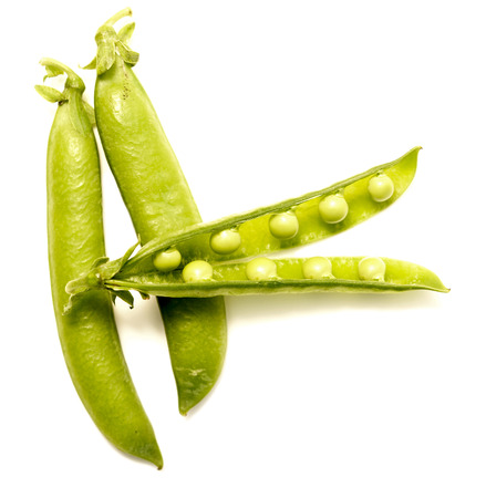 pea pods isolated on white backgroundの写真素材