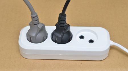 Plugged in electric devices in an extension cord