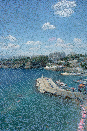 Mediterranean Sea and through the cracked glass, Antalya, Turkey