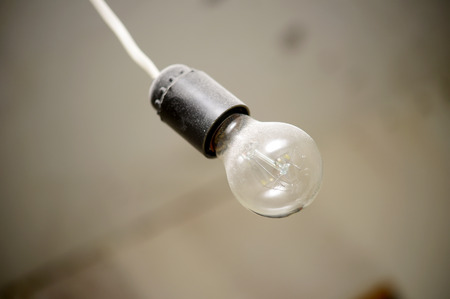light bulb lamp on old background with copy spaceの写真素材