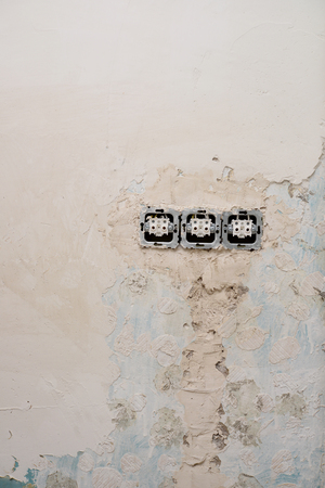 Damaged plug of abandoned building.の写真素材