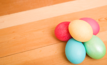 Easter eggs on a wooden backgroundの写真素材