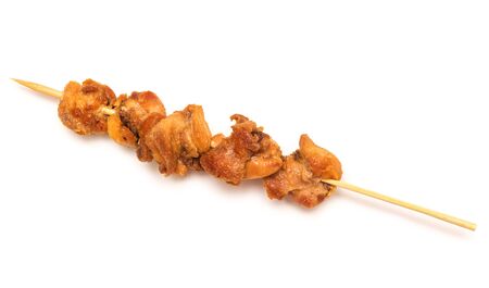 Skewers of chicken on white backgroundの写真素材