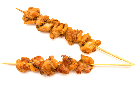 Skewers of chicken on white backgroundの写真素材