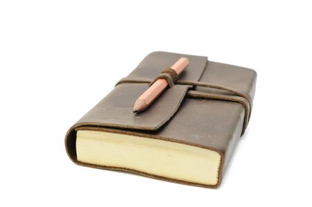 This is a Notebook and a pencil in isolated shotの写真素材