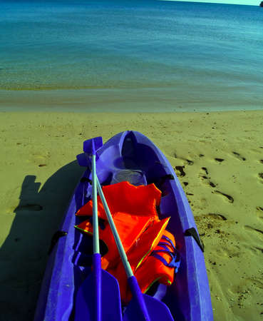Kayak sitting on the beachの写真素材