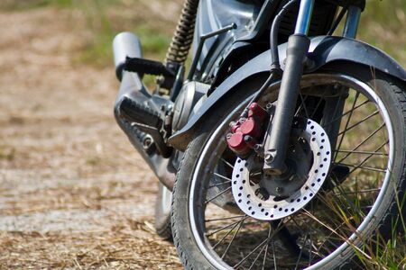 closed up old old Wheel motorcycles.