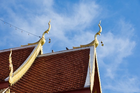 Roof of thai temple and blue sky ,white cloud overの写真素材