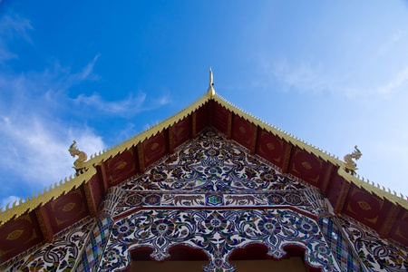 Roof of thai temple and blue sky ,white cloud overの写真素材