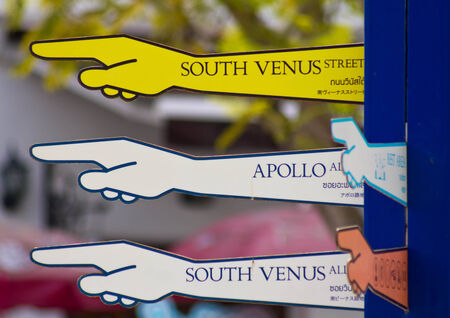 Hand signs in the park that way Closed up