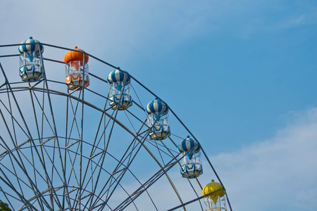 Ferris half circle and the sky as background 