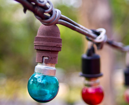 Closed up old bule lamp is rusty , blackgroundの写真素材