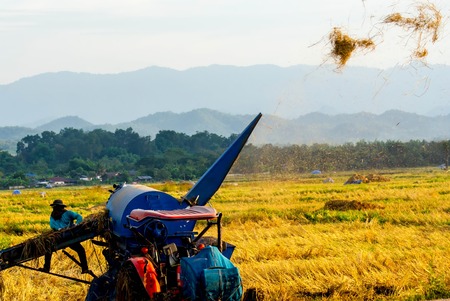 Threshing machine working in rural areas in Lampang Thailandの写真素材