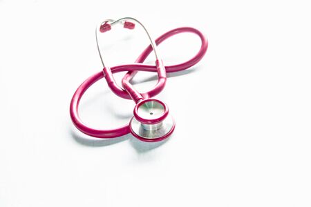 Red stethoscope isolated on white background , isolateの写真素材