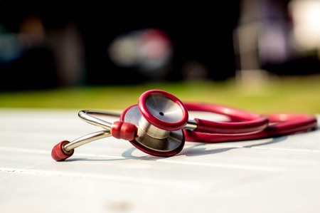 Red Stethoscopes  on white background,medical equipment and copy spaceの写真素材