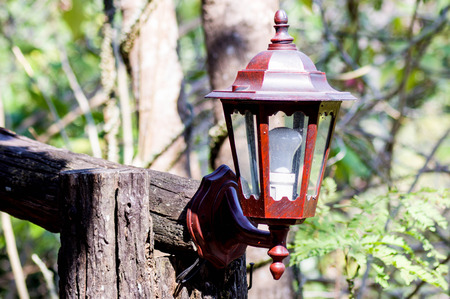 Old wooden lamp In the garden.Traditional Thai Wood Lantern.の写真素材