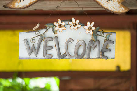 Old rusty welcome  metal sign.の写真素材