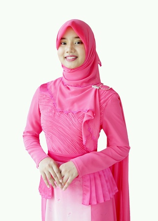 Muslim girl wearing a beautiful pink dressの素材