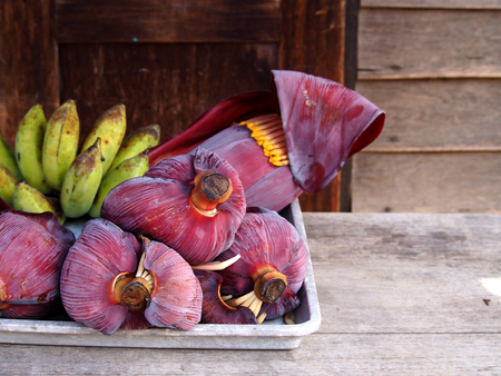 Banana blossom is on a trayの写真素材
