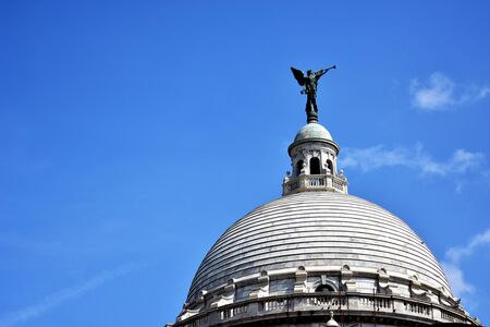 Marble dome with goddess on top of itの写真素材