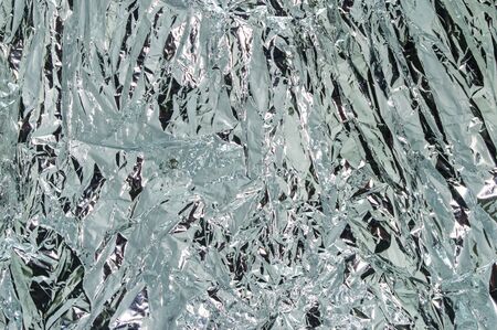aluminum foil background の写真素材