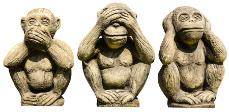 Three monkeys statues isolatedの写真素材
