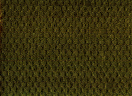 The close up of yellow bubble warp background