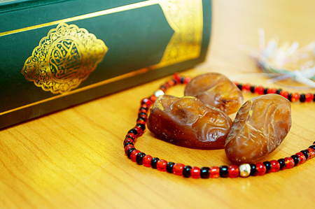 Date palm with quran for greeting ramadan kareemの写真素材